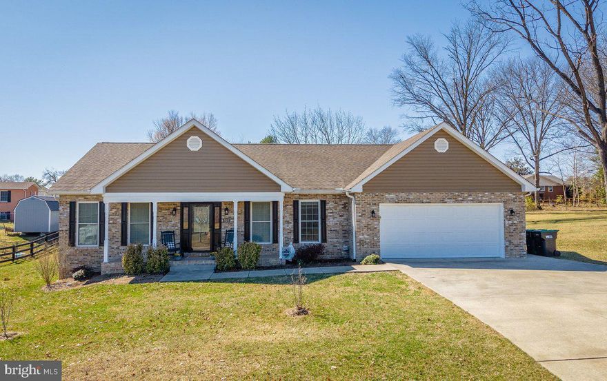 Welcome to this beautifully maintained  3-bedroom, 2-bath home in the heart of Woodstock! Featuring an open-concept layout, the spacious living, dining, and kitchen areas flow seamlessly together—perfect for both everyday living and entertaining. The kitchen is a standout with a large island, granite countertops, and stainless steel appliances.

The home offers a generous primary suite complete with a private bath and a large walk-in closet, creating a comfortable retreat at the end of the day. Two additional bedrooms and a full bath provide plenty of space for family, guests, or a home office.

A standout feature is the oversized garage—ideal for vehicle storage, a workshop, or even an entertaining space for gatherings. The fenced backyard offers plenty of room to relax, play, or garden. Additional storage is easy with convenient walk-up attic access and ample space.

Located in charming Woodstock, this home offers comfort, functionality, and room to grow both inside and out.