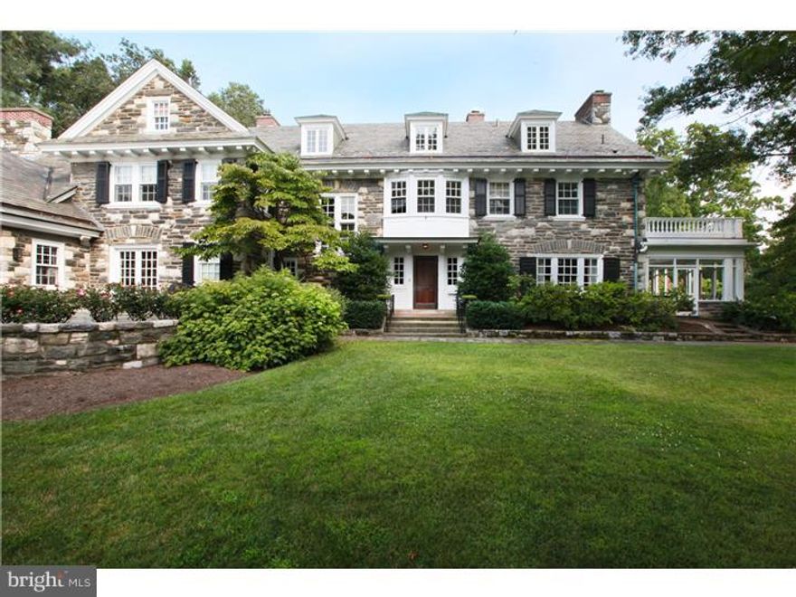 We are extremely proud to present "Rock House", undoubtedly one of Chestnut Hill's finest properties. Classic stone center hall colonial built in 1908, features a brightly lit gracious floor plan with coveted 20th century architectural details and moldings, meticulously restored, paired with all of the very best 21st century renovations and amenities. Extensive renovations throughout include an absolutely fabulous kitchen/pantry/family room designed by Peter Zimmerman with interior design by Katherine Glendinning and stunning custom cabinetry by local master craftsman Jim Arthur. Formal living room and dining room with fireplaces, fabulous enclosed sunporch. Upstairs, in addition to a gorgeous master suite with 2 fireplaces and terrace, two floors of family bedrooms,all with en suite baths, offices and living spaces. Beautifully finished lower level with recreation and media rooms, workshop, lots of storage and half bath. Separate carriage house perfect for office/gym and space for 3 plus cars. Set on a beautiful 1.13 acre corner lot in the St.Martins neighborhood with gorgeous perennial gardens, blue stone and brick terraces, designed by Carter Van Dyke Associates, creating an extremely private setting within walking distance to the Chestnut Hill village, schools, transportation and the Wissahickon trails.