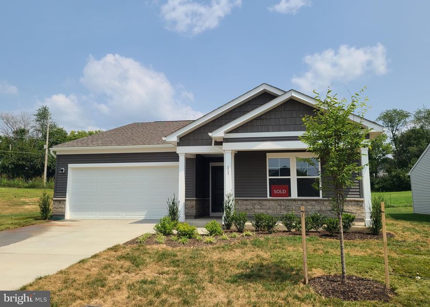 Be the first occupant of this BRAND NEW 3 bedroom, 2 bath Rancher in the centrally located Stone Spring neighborhood! This one level home with a cozy front porch and 2 car garage features a spacious open floor plan, gourmet kitchen with island/breakfast bar, a separate laundry room with washer and dryer included, primary suite with walk-in shower, double vanity, and walk-in closet, and a pocket office that will fit a small desk or could be used for extra storage. Easy commuter access to US-340 and WV-9 and close to shopping, restaurants, Hollywood Casino, and historic downtown Charles Town. Only 30-35 minutes to Frederick, MD or Leesburg, VA. No pets and no smoking allowed in the residence. Applicants must be able to pass a credit and background check and have past rental references. Minimum 650 credit score and monthly income must be at least 3x rental amount. Security deposit and first month's rent due at lease signing. Tenant must purchase renter's insurance.