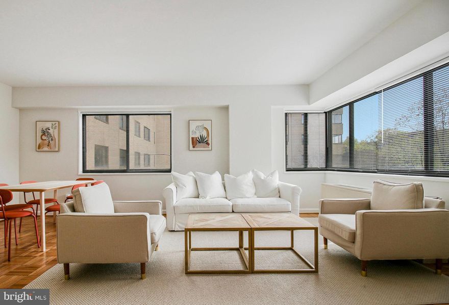 $30,000 renovation of this spacious and light filled Jr. 1 bedroom condo. Ideally located close to 2  metro stations (Van Ness and Cleveland Park), multiple restaurants, shopping, and Rock Creek Park. This rarely available corner unit is filled with natural light from large windows on both sides of the open plan living/dining room.  The kitchen has been fully renovated to a very high standard, with new stainless steel appliances,  brushed gold fixtures, and beautiful glass front cabinets. The thoughtful renovations include a completely separate sleeping area with closet and room for a Queen sized bed. Fully renovated bathroom with new toilet, vanity, medicine cabinet, lighting, and glass shower door. This condo enjoys all of the benefits of a 1 bedroom unit without the significantly higher condo fees. The $480 condo fee includes ALL utilities (gas, water, heat, cooling) plus all of the great amenities that Wilshire Park has to offer, such as a 24-hour Concierge, gym, bike storage, and furnished roof deck to relax and enjoy views of Rock Creek Park and the surrounding area. Wilshire Park is pet friendly too, with cats and dogs welcome.