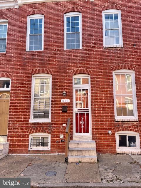 Welcome to 412 Port Street, a delightful two-bedroom, one-bathroom home in the heart of Baltimore. This cozy residence exudes classic charm and character, offering a comfortable living experience. As you step into the home, you're welcomed by a warm and inviting living space. Large windows bathe the room in natural light, creating a cheerful ambiance. The living room provides an intimate setting for relaxation and leisure. The kitchen is a functional space where you can unleash your culinary creativity. The charm of the kitchen adds to the overall character of the home. An adjacent dining area is perfect for enjoying home-cooked meals and entertaining guests. The two well-appointed bedrooms provide peaceful retreats, each with its unique character. The neutral tones in the bedrooms offer a blank canvas for personalization and comfort. The single bathroom, while not extravagant, is practical and serves the needs of daily living. This home is ideally situated, offering proximity to local amenities, shopping, and dining options. Easy access to transportation and major highways ensures convenient travel throughout Baltimore. Discover the charm of 412 Port Street and envision the possibilities. Schedule a viewing today and explore the unique character this residence has to offer.