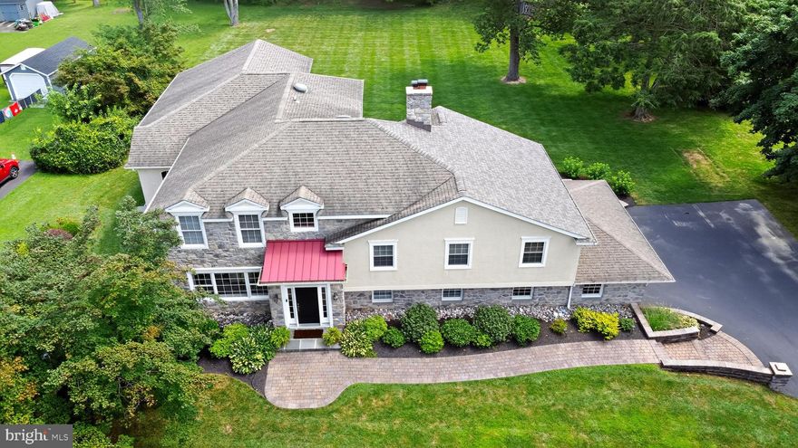 Set on a private and picturesque .93-acre lot, this exceptional 5-bedroom, 3.5-bath residence offers over 4,300 square feet of refined living space and an extraordinary connection to nature. Bordering the iconic Tyler Arboretum—a breathtaking 650-acre sanctuary with over 20 miles of walking trails—this home provides a rare opportunity to enjoy a tranquil lifestyle without sacrificing convenience. Located just 16 miles to Center City Philadelphia, 20 miles to Wilmington, Delaware, and only 20 minutes to Philadelphia International Airport, the best of both worlds awaits.
Step inside to discover a warm and welcoming open-concept layout thoughtfully designed for both everyday living and elegant entertaining. At the heart of the home is a chef’s kitchen with premium appliances, abundant cabinetry, and an oversized center island. The kitchen flows seamlessly into the sunlit breakfast area and inviting family room with a gas fireplace—an effortless blend of comfort and sophistication. French doors open to an expansive rear patio that invites outdoor dining and peaceful views of the lush, arboretum-adjacent backyard.
The second floor features three spacious bedrooms, including a private en-suite, as well as a cozy office nook ideal for remote work or study. The third level offers yet another flexible workspace or lounge, a fourth bedroom, and the exquisite primary suite—a true retreat featuring a luxurious spa-inspired bath and an expansive walk-in closet.
The lower level includes a second family room, an adorable and efficient laundry area, and a stylish powder room—offering additional living space for casual gatherings or relaxation. A full, unfinished walkout basement provides abundant storage or the potential for future customization. 
Enjoy unparalleled access to Ridley Creek State Park, just a half-mile from your doorstep, offering 2,606 acres of protected woodlands, a 5-mile paved multi-use trail, and year-round trout fishing.
This residence is ideal for the family seeking room to grow, work, and unwind—all in a premier natural setting rarely found in today's market.  All stucco has been thoroughly tested with excellent results.