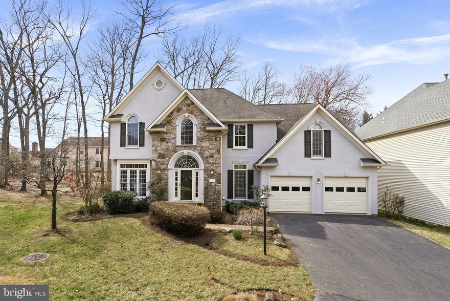 Elegant Edgemoore-built 4BR/3.5BA Executive home nestled on a quiet cul de sac in the heart of Vienna, backing and siding to woods! This charming residence with stone accents boasts a perfect blend of modern upgrades and timeless appeal, featuring a spacious and sunlit interior designed for comfort and convenience. Graced by hardwood floors throughout, the main level offers an inviting living room past the 2-story foyer, a formal dining room with extensive molding, gourmet kitchen with SS appliances, Silestone countertops, and large center island, plus powder room and main level laundry * Spacious and bright family room off the kitchen features a vaulted ceiling with skylights, gas fireplace, and 2nd staircase to the upper level. Upstairs, the generous primary suite opens to a spa-like en suite bath with dual sink vanity, separate soaking tub and shower, private water closet, and ample walk-in closet with custom organizing system. Three additional bedrooms and 2 full baths are just down the hall, including a large en-suite bedroom and bath * The walk-up lower level is an open, blank canvas to finish your way complete with rough-in for future bath * Outside, enjoy a beautifully landscaped yet low maintenance fenced rear yard full of daffodils, oak leaf hydrangeas, and your own Koi pond with 3 current residents * Relax or entertain on the newly surfaced wood deck just off the breakfast room, leading to the paver patio * The many updates include freshly painting the entire house, all new plumbing installed, new faucets, new light fixtures throughout, 2 brand new garage doors and lift systems in the 2- car garage, plus new high quality stair carpet to lower level * Rinnai tankless water heater, 2 Carrier HVACs * Ideally located near top-rated schools, parks, shopping, Metro, and major commuter routes, this home offers the best of suburban living with easy access to everything Vienna has to offer!