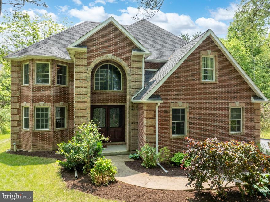 Welcome to this stunning custom-built home nestled in the prestigious Thistlewood community. Situated on a serene 1 acre lot with a wooded front and a gorgeous back yard that takes you away to your private oasis. This 4 bedroom, 3.5 bath residence offers the perfect blend of refined craftsmanship, timeless finishes and modern comfort. Step into a grand two story foyer with gleaming hardwood floors that flow seamlessly throughout the main level. Natural light fills the elegant living room, creating a warm and inviting atmosphere. The formal dining area is perfect for entertaining while the gourmet kitchen is a chef’s dream – featuring granite countertops, a large center island, stainless steel appliances including a gas cooktop, and a spacious walk-in pantry. Enjoy your morning coffee in the bright and airy breakfast nook, which opens directly to a beautiful back deck – ideal for dining and relaxing evenings. Just off the kitchen, the sunken family room offers a cozy retreat with a gas fireplace framed by stylish tile surround and new hardwood floors. Upstairs, you’ll find 4 generously sized bedrooms, including a luxurious owner’s suite with new carpet, a spacious walk-in closet and a spa-like owner’s bath complete with a soaking tub and a walk-in shower. Two additional full baths and an upper level laundry room add comfort and convenience. The partially finished walk-out lower level provides ample space for future expansion or recreation, complete with rough-in plumbing for a full bath. Enjoy year-round energy efficiency with geothermal heating and cooling, all within a beautifully designed home that showcases quality and attention to detail at every turn. Don’t miss your chance to own a piece of Thistlewood luxury.