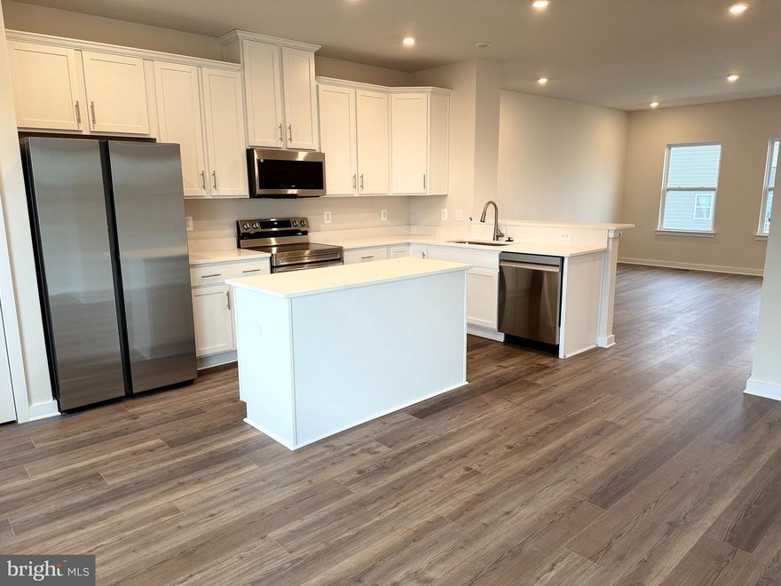 🏡 Model Home – 54 Sumter Ave
MOVE IN NOW | St. Paul Townhomes – The Largest in the Ranson Area!

Huge backyards = endless room for family fun, games, and backyard cookouts! 🍔🌳

✨ Up to 2,000 Sq. Ft. of Modern Luxury
💰 Special Programs Available for First-Time & Second-Time Buyers!

Home Features

🛏 4 Bedrooms
🛁 2 Full & 2 Half Bathrooms
🚗 1-Car Garage

Main Level Highlights

• Bright, open-concept layout — perfect for entertaining 🥂
• Chef-inspired kitchen with stainless steel appliances, QUARTZ countertops, WHITE cabinets, upgraded LVP flooring, and LVP in the living room 🍽️

Upstairs Retreat

• Spacious primary suite with walk-in closet & spa-like rain shower with 12x24 tile floor-to-wall 🚿
• Two additional bedrooms + full hallway bath 🛌
• 12x24 tile in laundry room and all full bathrooms 🧺

Fully Finished Basement

• 4th bedroom with private HALF bathroom — perfect for guests, a home office, or media room 🎮🎬

📲 Call or text the listing agent today for full details!

📸 Photos and pricing are for reference only.