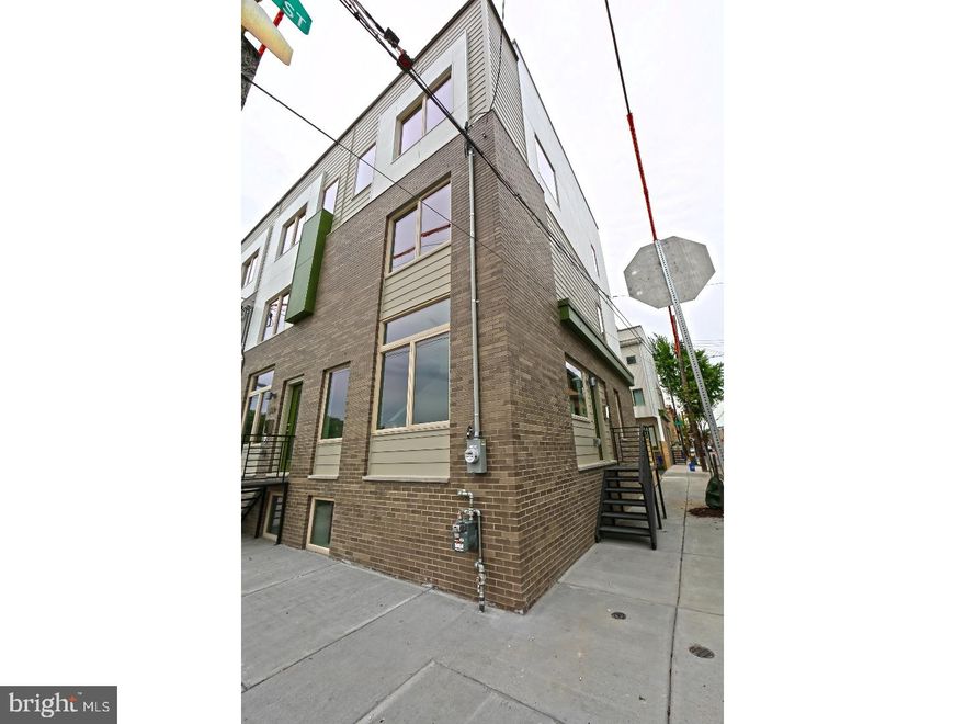 Welcome home to your brand new corner home with one car parking and ready for immediate move in. First floor has an open floor plan, hardwood floors, including the custom kitchen, dining area and living room. The meticulously designed, chef's kitchen offers quartz countertops, stainless steel appliances, subway tile backsplash, slow close cabinetry and everything else you can imagine! Walk up to the second floor and find a laundry room, a beautifully finished full bathroom and two large, light filled bedrooms each with generous closet space and windows! Walk up to the third floor where you will find a full floor bedroom with walk in closet and gorgeous double vanity bathroom and huge walk in shower! On to the roof deck and find ample entertaining space accompanied by 360 degree views, including Center City! Full finished basement along w one car parking! Dual zone HVAC and security system is already installed! Located within a short walk to public transportation, I95,  dining, and entertainment, you'll also find grocery and park close by and close to all that Fishtown has to offer! First month, last month and 1 months rent security deposit due at time of lease signing after approved application. EZ to show.