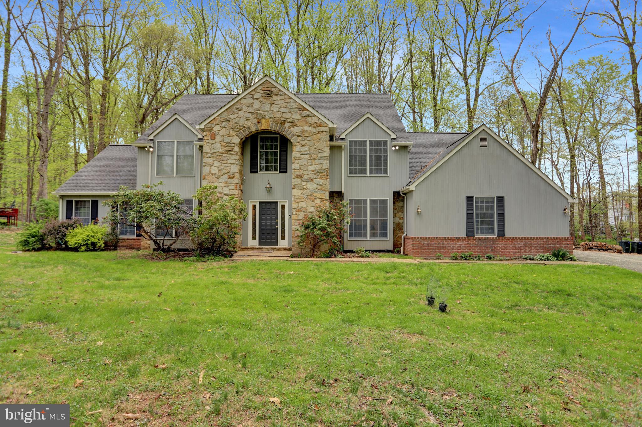 Prepare to be amazed by this one-of-a-kind rental home offering over 5,400 square feet of refined living space nestled on a serene 2.46-acre wooded lot. This stunning residence combines elegance, comfort, and functionality in a way that’s rarely seen in rental properties.
Step through the formal entryway and be welcomed by a dramatic curved staircase, setting the tone for the luxurious features throughout. The main level boasts a spacious gourmet kitchen with a sun-filled breakfast room, an inviting family room, a richly appointed library, and access to a screened porch and expansive deck — ideal for entertaining or enjoying the peaceful surroundings.
The fully finished lower level is a standout, complete with a second full kitchen, exercise room, and large recreation area, a spacious bedroom and full bathroom — perfect for extended stays, multigenerational living, or guest accommodations.
Upstairs, you’ll find 4 generously sized bedrooms and 2.5 beautifully updated bathrooms, offering ample space and privacy for everyone. The 2-car garage provides convenience, while the lush, wooded lot offers privacy and natural beauty just minutes from everyday amenities.
This is more than a home — it’s a retreat. An unbelievable rental opportunity that truly has it all. Don’t miss your chance to live in this extraordinary property!