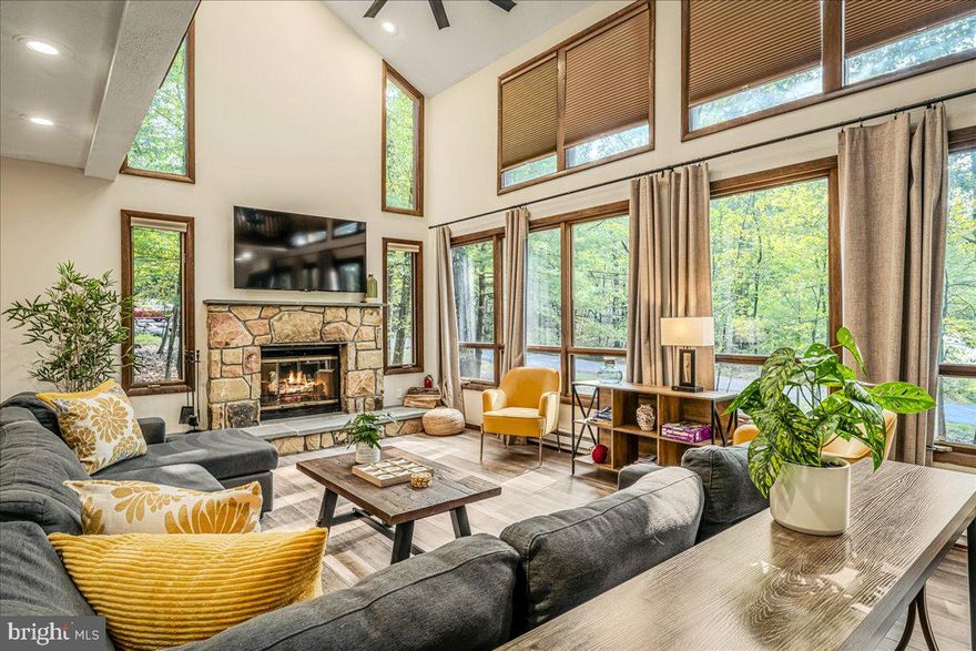 Looking for a well-kept, STR-friendly home inside a community with amazing amenities? Look no further!ALL NEW WINDOWS & STR COMPLIANT NOW. NEW AC WALL UNITS.
This spacious property offers 3 bedrooms, 4 bathrooms, and a fully finished walk-out basement complete with a game room, hangout space, and its own bath—perfect for entertaining. Send the kids downstairs while the adults relax upstairs or enjoy the screened-in porch overlooking the peaceful surroundings. Inside, you'll love the modern kitchen and baths with quartz countertops, cathedral ceilings, and skylights that fill the home with natural light. The design blends modern updates with that classic Poconos charm. With the right offer, this home can be sold fully furnished, making it an easy turnkey option for those seeking a vacation property or STR investment. When you're not enjoying the home or community amenities, you're just a short drive to Shawnee Mountain Ski Area and the world-famous Camelback Resort, plus countless restaurants and attractions throughout the Poconos.