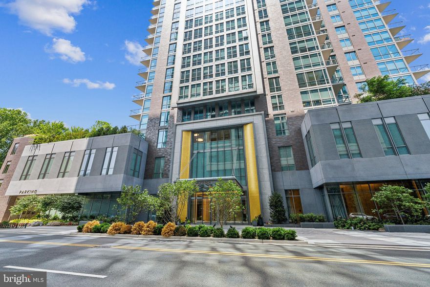 Indulge in unparalleled luxury within this exquisite 3-bedroom, 3-bathroom McLean-Tysons Corner condominium. Soaring 11-foot ceilings, and masonry walls ensure privacy and peaceful living.
A direct access elevator whisks you up 17 floors to a grand private foyer, setting the stage for breathtaking city panoramic views and sophisticated finishes.  Breeze inside the sunlit contemporary interiors, complemented by over 280 square feet of private outdoor space.  The gourmet kitchen is a chef's dream, featuring top-of-the-line Miele appliances, a concealed-panel refrigerator and dishwasher, all white soft-close ItalKraft kitchen cabinets with underlighting, and a waterfall quartz island. The expansive living room with a tray ceiling provides an ideal space for entertaining, while the sunlit breakfast room offers a cozy spot for casual dining.  Pristine Khars white oak hardwood floors carried throughout the home. Each of the 3 bedrooms are designed for tranquility, with spacious walk-in closets and luxe bathrooms featuring oversized showers with frameless glass doors and built-in seats. The primary bathroom offers a freestanding soaking bath and double vanities, which can also be found in the second bathroom.  The second bedroom includes a private balcony, perfect for enjoying peaceful mornings or relaxing evenings. For added convenience, the property is equipped with spacious ceiling high cabinets and plenty of storage, and comes with five new air filters installed in July 2024. The elegance extends beyond Unit #1703, with a state-of-the-art fitness room offering on-demand Echelon workouts, a sparkling outdoor pool, special dog grooming suite, and beautifully landscaped butterfly gardens. Additional amenities include a versatile garden terrace, a clubroom lounge with a catering kitchen, and a penthouse vista suite for private events.  Conveniently located within a short distance to the Silver Line Metro, this opulent condo offers easy access to Washington, DC, and major airports. With nearby dining, shopping, and entertainment options, including Tysons Galleria and Whole Foods, this residence combines urban sophistication with serene green spaces.   Included are two assigned garage parking spaces, side by side next to the public and private elevators.  Experience the epitome of refined living with your very own 3-bedroom condominium right in the heart of Tysons Corner. Schedule your private viewing today for this extraordinary home.