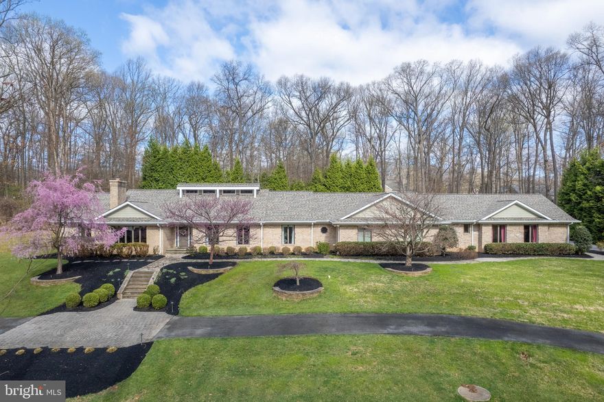 MAJOR PRICE ADJUSTMENT 4/23*** PERFECT MULTI-GENERATIONAL HOME IN BUCKSKIN WOODS LOCATED ON A PRIVATE 3-ACRE PICTURESQUE LOT** THREE PRIMARY SUITES  ON THE MAIN LEVEL WITH SITTING AREAS & PRIVATE FULL BATHROOMS**  MAIN LEVEL FORMAL LIVING & DINING ROOMS / SUNKEN FAMILY ROOM WITH VAULTED CEILINGS & SKYLIGHTS / EAT-IN KITCHEN & ISLAND / TWO POWDER ROOMS & FLORIDA ROOM ADDITION OVERLOOKING THE POOL AREA** LOWER LEVEL MEDIA ROOM / GAME ROOM / FULL GYM (EQUIPMENT NEGOTIABLE) / SAUNA / REC ROOM & BEDROOM #6** FIVE-CAR ATTACHED GARAGE WITH ADDTIONAL PARKING FOR APPROX 10 CARS** HOME HAS OVER 11,000 FINISHED SQ FT** MANICURED BACKYARD WITH A HEATED POOL; FIREPIT & COVERED BAR/ENTERTAINMENT AREA**  BRAND NEW ROOF & 5-ZONE HVAC SYSTEM** WHOLE HOUSE GENERATOR SYSTEM** FANTASTIC SCHOOL DISTRICT AND EASY ACCESS TO ALL COMMUNITY AMENITIES!!