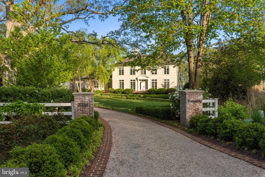 Welcome to "Tranquility." This stately waterfront home offers unobstructed views of Harness Creek, the South River, and the Chesapeake Bay.  Located in Wimbledon Farms, just minutes from historic downtown Annapolis, this 7BR/6BA home on 1.47 acres offers a truly serene setting for family living and entertaining. Timeless elegance and well-executed details throughout create an atmosphere of charm and sophistication, while the living spaces maintain a relaxed feeling, perfect for coastal living. From the moment you enter the light filled foyer, you’ll notice the open spaces, rich, white oak wood floors, crown moldings, arched recesses, custom built-ins and stunning water views. This extraordinary home is the epitome of understated luxury, taste, and craftsmanship. The gourmet kitchen is a chef's dream with sleek custom cabinetry and top of the line appliances, perfect for everything from large gatherings to intimate soirees. Retreat to the pool for a refreshing dip, stroll along the beach, or launch your boat from the private pier. The bedrooms are spacious with en suite baths and water views, providing privacy and comfort for family and guests. The primary suite is truly impressive, boasting a spa-like en suite bath complete with soaking tub, oversized walk in shower, and a well-appointed walk in closet. The grounds are beautifully manicured and landscaped with an inground sprinkler system that helps keep the property maintained year-round. The home also features an elevator, generator, motor court with two garages, lower level with family/game room and home gym, three zones of HVAC, an in-law/au pair/guest suite above the garage, private office, two gas fireplaces, a wood burning fireplace, automatic shades, exquisite draperies, ample storage, pool bath, and a deep-water, community pier. In every way tasteful, elegant, and inviting, this home illustrates the intersection of great design, well-executed craftsmanship, and an exclusive waterfront setting. Appraisers please call me for further information regarding final price.
