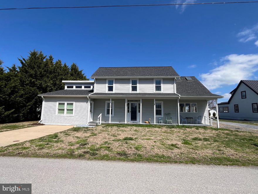 Located minutes from St. Michaels this waterfront property is a boater's dream. Tilghman, is a small island big on history, nature and local lore. Situated just over the Knapps Narrows Bridge this home offers a main house with first floor master suite.  The first floor is open with custom details and just perfect for hosting friends and family. A custom spiral staircase leads to a second floor with 4 additional guest bedrooms and bath.  This renovated home also has a separate 3 bay garage with a 2-bedroom 2-bath water view apartment with a nice open living and dining area and total square footage of 768.  The main house has an attached 1 bedroom 1 bath in-law suite.  Great space for your guests or potential for a vacation rental. A nice wide-open lawn leads you to the dock with 7 boat slips.  Right on the Knapps Narrows. Tilghman is the perfect place to start making your Eastern Shore Memories.  New pictures to come...