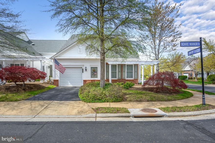 Enjoy main level living in this immaculate Burlington model end-unit villa with 3 bedrooms, 3 baths and a loft in highly desirable Potomac Green. The main level features wood floors, a huge family room with soaring 2-story ceiling, a gourmet kitchen, 2 bedrooms and 2 baths, and a sunroom that opens to a private patio. The primary bedroom has great natural light, a tray ceiling, and a luxurious bathroom with dual sinks and an custom oversized shower. The upper level boasts a third bedroom, a full bath, and an enormous light-filled loft with plenty of space for a second family area, an office, or exercise equipment. Experience all the amenities of Potomac Green plus easy access to major transportation routes and all the shopping, restaurants and entertainment in One Loudoun.