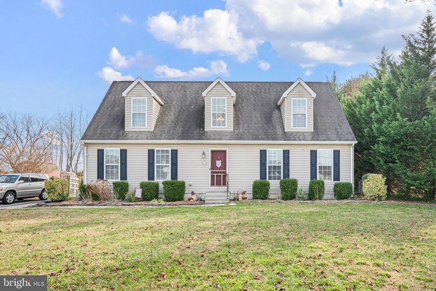 Welcome to 29 E Walnut Street — a charming 3-bedroom, 2.5-bath Cape Cod set on a spacious half-acre lot in the heart of Magnolia without an HOA! This home blends classic style with modern comfort, featuring an inviting open-concept layout and a highly sought-after first-floor primary suite. Step inside to a bright and open living space where the living room with fireplace, dining room, and kitchen with center island flow seamlessly together—perfect for entertaining or everyday living. Sliding glass doors off the dining area open to a large backyard, offering endless potential for outdoor activities, gardening, or relaxation. The first-floor master suite, positioned just off the dining room, includes a large walk-in closet and a private bathroom complete with a soaking tub and separate shower. Upstairs, you’ll find two oversized bedrooms and a full bathroom—ideal for family, guests, home office setups, or additional flex space. Situated on a 0.5-acre lot, this property provides the privacy, space, and comfort you've been looking for, all while being conveniently close to local amenities, parks, Dover Air Force Base, and major commuter routes. Many updates including New Instant Hot Water Heater, Newer Washer and Dryer, Bedroom Fans, Rainsoft Softener and Filter system. 
Move-in ready and full of charm, this Magnolia Cape Cod is one you won’t want to miss!