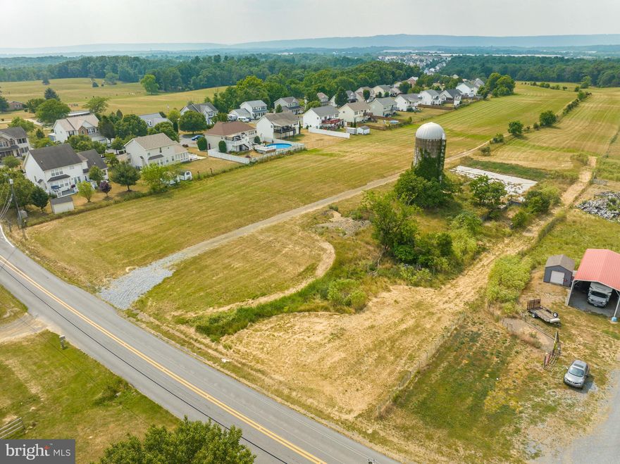 BUILDERS!! 99 townhouse lots shovel ready. 
Preliminary engineering already done for 99 townhomes - ready to develop! Water at road, sewer cap brought in. Great location- right beside Mills Farm development!