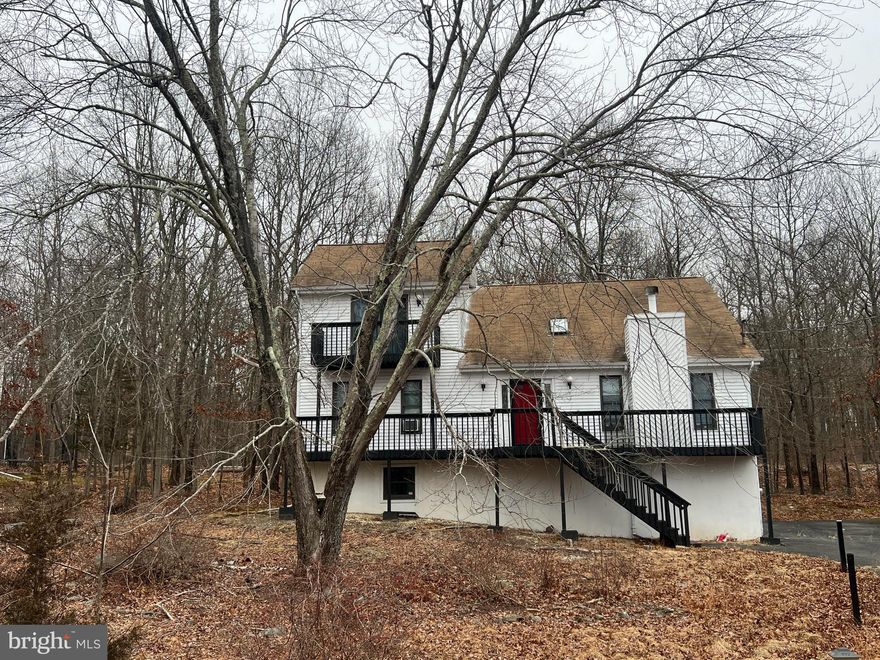 BANK APPROVED SHORT SALE AT CURRENT LIST PRICE . This is a gated community.  Showing Agents must present photo ID and a business card, or a real estate license.   This is A Short Sale. There is some moisture in the property that we are looking to mitigate, but awaiting bank approval.  This expansive 6-bedroom, 3-bath contemporary home offers the perfect blend of style and space in a lively, amenity-filled community. Ideally located directly across from the lake and just a short walk to the beach, it’s a dream setting for year-round living or weekend escapes. 
Inside, enjoy two elegant primary suites, a gorgeous brand-new kitchen outfitted with stainless steel appliances, and a dramatic living room featuring soaring cathedral ceilings, skylights, and a striking stone fireplace. Every inch of this home is in pristine condition, with flexible rooms that can be transformed into a home office, gym, or creative studio. Step out onto the large deck or relax for hours in the enclosed porch—both perfect for entertaining or unwinding. Additional highlights include a paved driveway, a spacious 2-car garage, and low monthly HOA fees with a modest capital contribution.

Buyer pays $10K loss mitigation fee. The  2.5 Realtor fee is paid by the lender. If reduced by the lender, the total realtor fee will be split 50/50 between listing and selling brokers. ABBA Loss Mitigation, LLC works with Deedworks Title to process short sales. The majority of title work, including searches and tax certifications has already been done, and ABBA wishes to allow Deedworks to bring the settlement to completion. If your buyer chooses to not use Deedworks, ABBA Loss Mitigation will need to know immediately as it may create extra work and expenses.