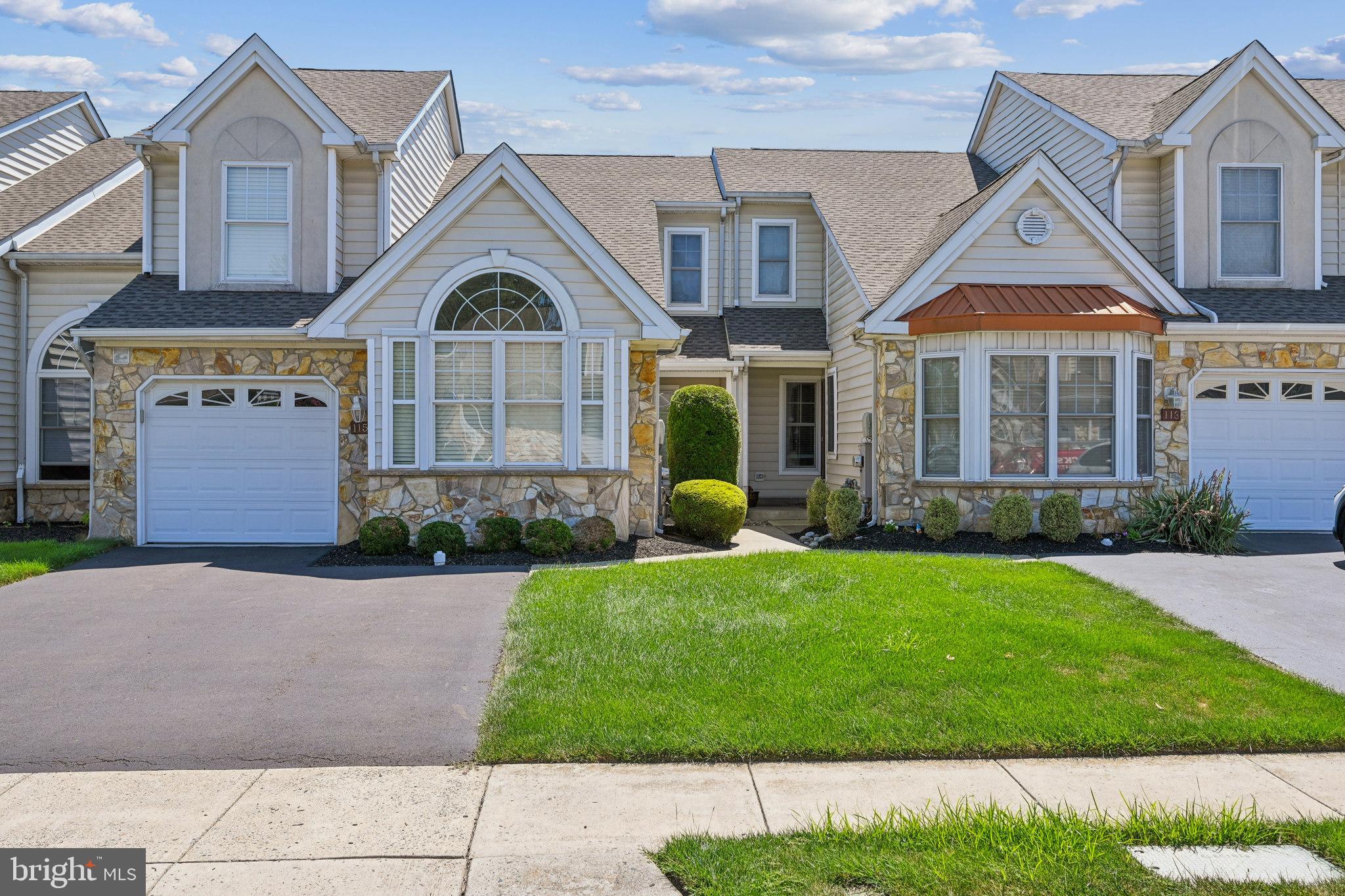 Nestled in the desirable Ivygreene community, this charming townhouse offers a comfortable, low-maintenance lifestyle in the award-winning Council Rock School District. Built in 2001, the home features two bedrooms, 2.5 bathrooms, and a thoughtful layout that blends open spaces with private retreats. The main floor is designed for ease and comfort, anchored by a spacious primary bedroom with an en-suite bathroom—perfect for single-level living. A bright den with vaulted ceilings boasts abundant natural light via a dramatic circle top window. This room offers a versatile space that could serve as a home office, cozy lounge, or even a third bedroom, if needed. The open living and dining areas flow effortlessly, creating a welcoming space for entertaining. A convenient main-level laundry room with built-in cabinets and a sink adds both function and style. Upstairs, a generous loft provides flexibility for a second sitting area, home office, or creative space. The additional bedroom and full bath offer privacy for guests or family members, while a large utility/storage room keeps seasonal items neatly tucked away. An attached front-entry garage adds convenience and extra storage, while the association takes care of lawn care, common areas, and community amenities—leaving you more time to enjoy the neighborhood and surrounding area. With its prime location, adaptable layout, and warm community feel, this Ivygreene home is ready to welcome you to your next chapter. Seller is offering a 5K flooring allowanc.