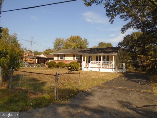 Nice size Rancher offers 3 bedrooms and full bath. Hardwood floors in living and dining rooms. Open floor plan on main level. Kitchen has table space. Covered front porch and yard is completely fenced with Extra long driveway. Close to schools , shopping and parks. Easy access to rt 100 & rt 10. Agents vies documents and agent remarks for contract details. Call CSS to show. OPENS TO INVESTORS 10.27