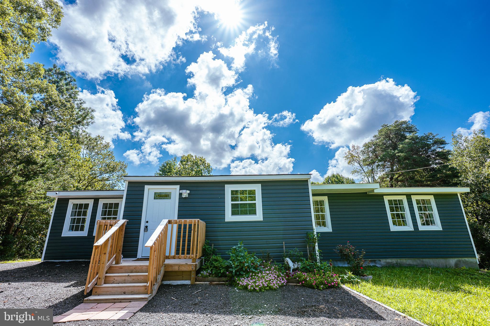 Beautiful & Updated 5 bedroom-2 full bathroom rambler on 1.38 Acres – Move-In Ready!
Welcome to this beautifully updated and spacious rambler, perfectly situated on a generous 1.38-acre lot. Flooded with natural light, this home offers both comfort and modern upgrades throughout.
The heart of the home is the redesigned kitchen, featuring brand-new cabinetry, sleek quartz countertops, and stainless steel appliances—ideal for both everyday living and entertaining. The open-concept living room offers a warm, inviting space perfect for gatherings. With flexibility in mind, this home includes a bonus room or den that can easily be converted into a sixth bedroom, home office, or media room to suit your lifestyle. The private owner’s suite boasts ample closet space and a beautifully updated en-suite bathroom for your own personal retreat.
Major updates provide peace of mind, including a new roof, HVAC system, water heater, and washer/dryer—all recently replaced.
Step outside and enjoy the serene outdoor setting with endless possibilities—gardening, recreation, or simply relaxing in the privacy of your expansive yard. Don’t miss the opportunity to own this move-in ready gem with room to grow, just waiting for your personal touch.