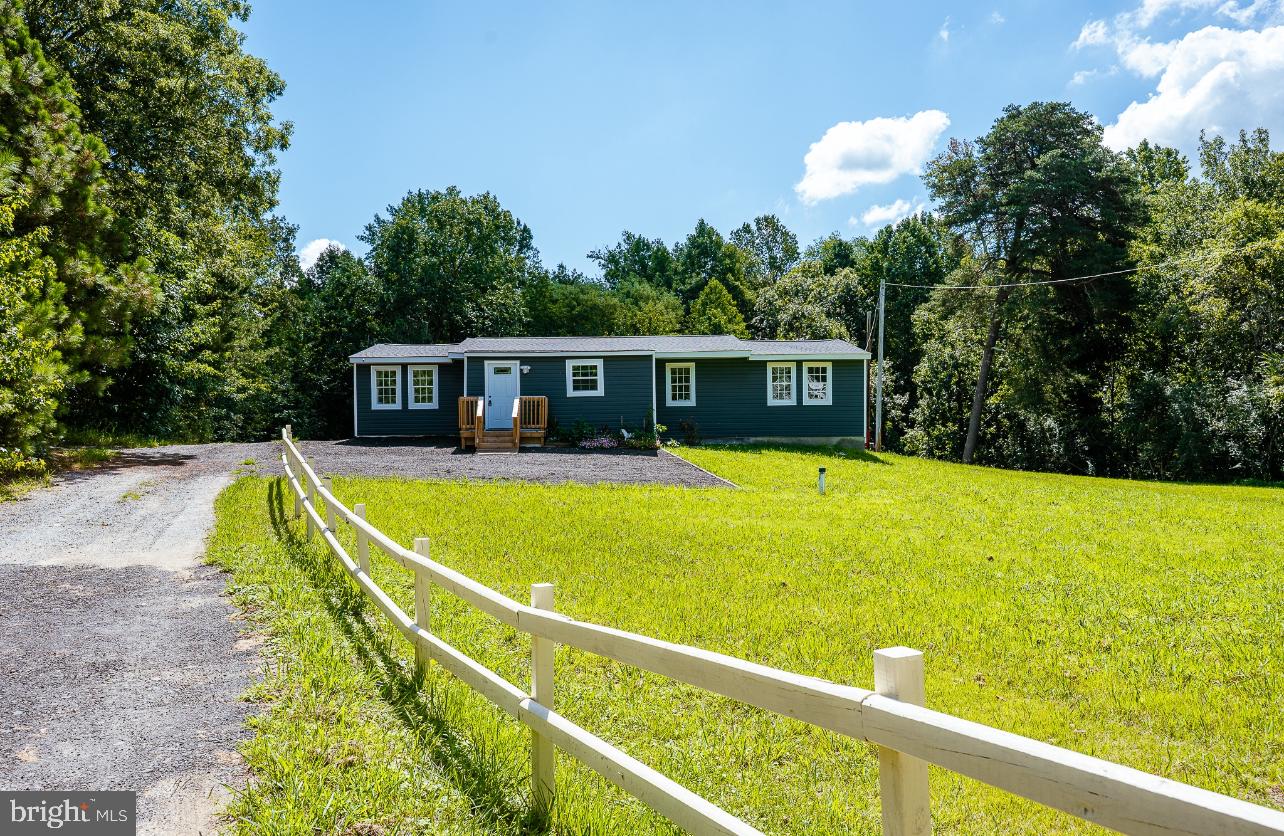 ***CLOSING HELP AVAILABLE***
Beautiful & Updated 5 bedroom-2 full bathroom rambler on 1.38 Acres – Move-In Ready!
Welcome to this beautifully updated and spacious rambler, perfectly situated on a generous 1.38-acre lot. Flooded with natural light, this home offers both comfort and modern upgrades throughout.
The heart of the home is the redesigned kitchen, featuring brand-new cabinetry, sleek quartz countertops, and stainless steel appliances—ideal for both everyday living and entertaining. The open-concept living room offers a warm, inviting space perfect for gatherings. With flexibility in mind, this home includes a bonus room or den that can easily be converted into a sixth bedroom, home office, or media room to suit your lifestyle. The private owner’s suite boasts ample closet space and a beautifully updated en-suite bathroom for your own personal retreat.
Major updates provide peace of mind, including a new roof, HVAC system, water heater, and washer/dryer—all recently replaced.
Step outside and enjoy the serene outdoor setting with endless possibilities—gardening, recreation, or simply relaxing in the privacy of your expansive yard. Don’t miss the opportunity to own this move-in ready gem with room to grow, just waiting for your personal touch.