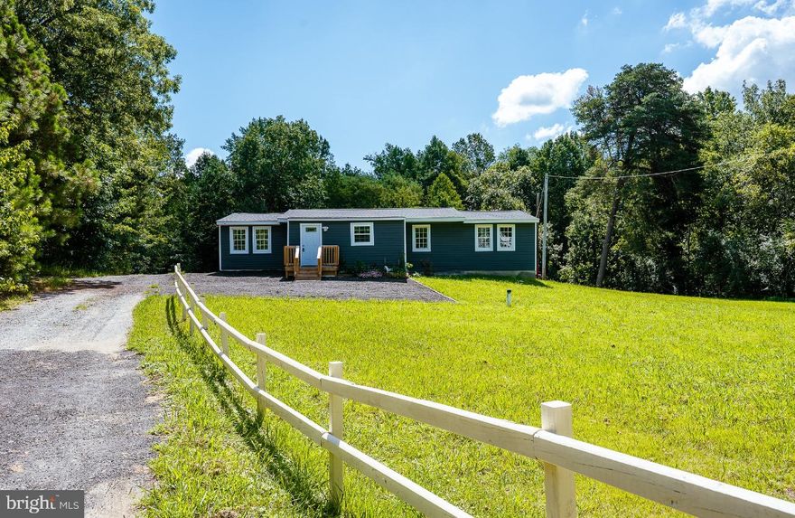 ***CLOSING HELP AVAILABLE***
Beautiful & Updated 5 bedroom-2 full bathroom rambler on 1.38 Acres – Move-In Ready!
Welcome to this beautifully updated and spacious rambler, perfectly situated on a generous 1.38-acre lot. Flooded with natural light, this home offers both comfort and modern upgrades throughout.
The heart of the home is the redesigned kitchen, featuring brand-new cabinetry, sleek quartz countertops, and stainless steel appliances—ideal for both everyday living and entertaining. The open-concept living room offers a warm, inviting space perfect for gatherings. With flexibility in mind, this home includes a bonus room or den that can easily be converted into a sixth bedroom, home office, or media room to suit your lifestyle. The private owner’s suite boasts ample closet space and a beautifully updated en-suite bathroom for your own personal retreat.
Major updates provide peace of mind, including a new roof, HVAC system, water heater, and washer/dryer—all recently replaced.
Step outside and enjoy the serene outdoor setting with endless possibilities—gardening, recreation, or simply relaxing in the privacy of your expansive yard. Don’t miss the opportunity to own this move-in ready gem with room to grow, just waiting for your personal touch.