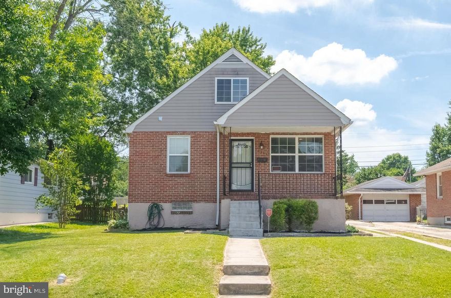 Step into this hidden gem nestled in the heart of Hamilton Heights.  This beautifully modernized Cape Cod features four bedrooms, three bathrooms, and a main level powder room, perfectly blending contemporary elegance with everyday comfort.  On the first floor, you'll find a traditional floor plan that boasts a seamless flow from the living room to the dining room, leading into a gourmet kitchen equipped with granite counters and stainless steel appliances. Conveniently located on the main level is the primary bedroom with an en-suite full bathroom and a walk-in closet, adding that sought after touch. The second floor offers two ample bedrooms with a full bathroom, providing comfortable living space for family or guests.  The fully finished open basement includes a family room, a bonus room used as a fourth bedroom, a full bathroom, and a dedicated laundry room, providing plenty of space to relax and enjoy.  Step outside onto a deck overlooking a wonderful yard, perfect for summer enjoyment. Shade trees in the rear add a touch of nature and tranquility. Parking is ample with a deep extended driveway.   This home is a must-see.