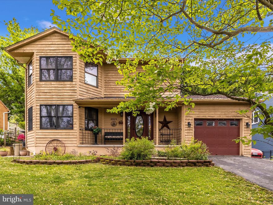 Located in The Meadows at Lake Linganore, a community rich with amenities, you will find your new home! 6909 Fox Chase Rd offers three bedrooms, three and a half baths and finished lower level. from the front porch, enter the main level to a welcoming foyer and guest powder room, just off the foyer is an inviting living room with large bay windows, wood burning fireplace and glowing hardwood floors, continue through to the formal dining room with hardwood floors and a gorgeous set of french doors leading to the large rear deck continue in to your spacious kitchen complete with a breakfast nook, slider to the rear deck and access to the one car garage, round out the main level. Take the beautiful hardwood staircase to the second level and be prepared to be delighted! The primary bedroom with its beautiful hardwood flooring and bay windows complete with custom shutters creates a tranquil state of mind. The primary bath, newly remodeled is gorgeous with a large custom tiled double shower, custom vanity with unique double sinks and walk in closet, plenty of space to share here! Two nice sized bedrooms, full hall bath and laundry area concealed with a barn sliding door wraps up the second level. Enjoy entertaining family and friends? Head to the lower level, plenty of room for gaming, watching sports or favorite movies on the three mounted flat screen TV's and no entertainment area would be complete without a wet bar which includes  two refrigerators. The lower level also includes a full bath and room for storage as well as on outside entrance. During the warmer seasons take the party outside to the large two level deck, lots of space for cornhole on the lower deck, dining on the upper deck complete with a canopy, many happy memories will surely be made here. This home offers so much, schedule a showing today to see for your self. You won't be disappointed!