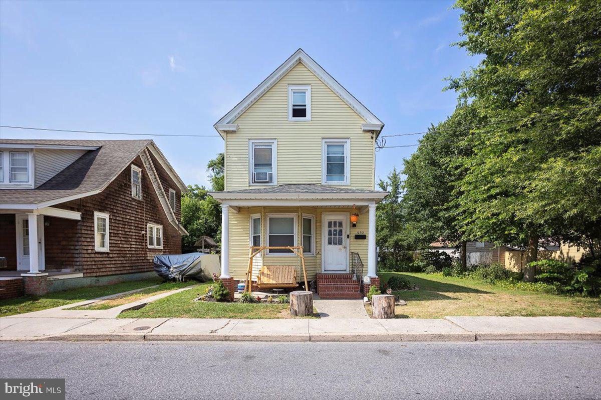 Step back in time with this charming 1910 two-story home full of character and potential! Featuring 3 bedrooms, 1 full bath, and hardwood floors throughout, this home is ready for someone to bring their vision to life. The layout is classic and cozy, with great bones and original touches that add personality you just don’t find in newer homes. Outside, enjoy a fenced-in backyard perfect for pets or play, and a detached garage/workshop—ideal for hobbies, storage, or your next project. With a little love and updating, this one could really shine!