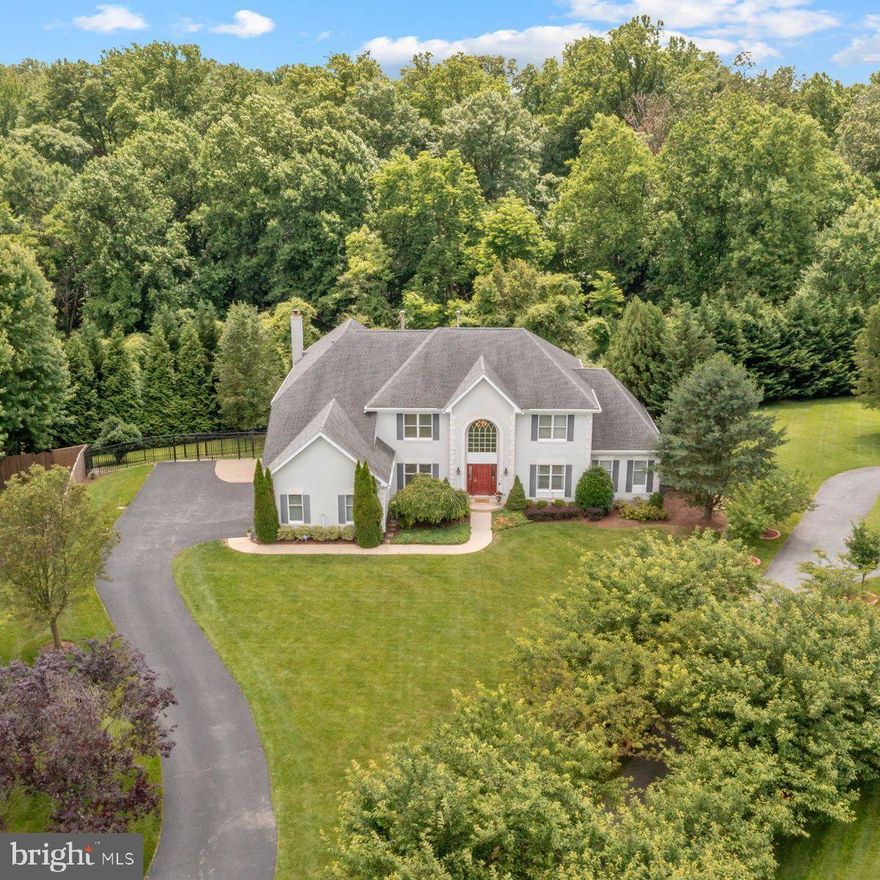 Stop your search—this home is perfect! Welcome to a stunning, large, and prestigious residence with a three-car side load garage in the highly sought-after Brooke Manor Estates. This Toll Brothers Sterling Provincial Model is one of the largest in Brooke Manor and has been meticulously maintained by the original owners.

Step into the grand two-story great room, featuring a magnificent stone fireplace (with a Heat N Glo Escape 35 Gas Insert added in 2021) and a wall of Palladian windows that flood the space with natural light. A back staircase provides easy access to the upper level.

At the rear of the home, a bright sunroom with multiple skylights adjoins the breakfast room and a gourmet kitchen. The kitchen boasts hard surface counter tops and a center island with a gas cooktop.

The main level is thoughtfully designed with an elegant banquet-sized dining room, a living room, an office, a laundry/mud room, a powder room, and a spacious great room.

The inviting two-story foyer features a La Scala crystal chandelier (with a motorized Aladdin Lift) and leads to a curved stairway rising to the upper-level owner's suite. This luxurious suite includes a tray ceiling, dual walk-in closets, and a spa-like bath with double sinks, a soaking tub, a separate shower, and a skylight. The upper level also includes three generously sized bedrooms—one with its own bath and a shared "buddy" style bath with dual sinks.

The incredible walkout basement offers a huge rec room, a full kitchen with stainless steel appliances, a full bath, an exercise area, and a media space. There is also a Heat N Glo Escape 35 Gas Insert in this lower level fireplace.  Sliding glass doors lead to an attractive paver patio surrounded by lush landscaping.

Enjoy summer BBQs on the composite deck that overlooks a fenced backyard with an evergreen backdrop.  A large shed, built on a cement foundation, is located directly under the deck.

The current owners have made numerous updates, including a new roof (2011), vinyl wrapping of all exterior wood (2011), installation of a Tankless Rinnai hot water heater, replacement of both HVAC systems, new garage doors (2016), installation of overhead garage storage racks, replacement of kitchen appliances (2016-2020), installation of 6” no-worry gutters and gutter protection system with 3”x4” downspouts (2016), installation of an entire home water filter on the main water line (2021), replacement of four of the five toilets with Kohler Intrepid models (2023), replacement of the basement air conditioner condensing unit dual capacitor (2023), and installation of new Bali cell shades and roller shades in the owner’s suite, basement, and family room (2024).  Both HVAC systems have i-Wave-R Air Purifiers installed. 

Located in a friendly neighborhood with a community pool, two tennis courts, a playground, and a soccer field, and only a 5-minute drive to the ICC MD Route 200, this home is sure to impress.