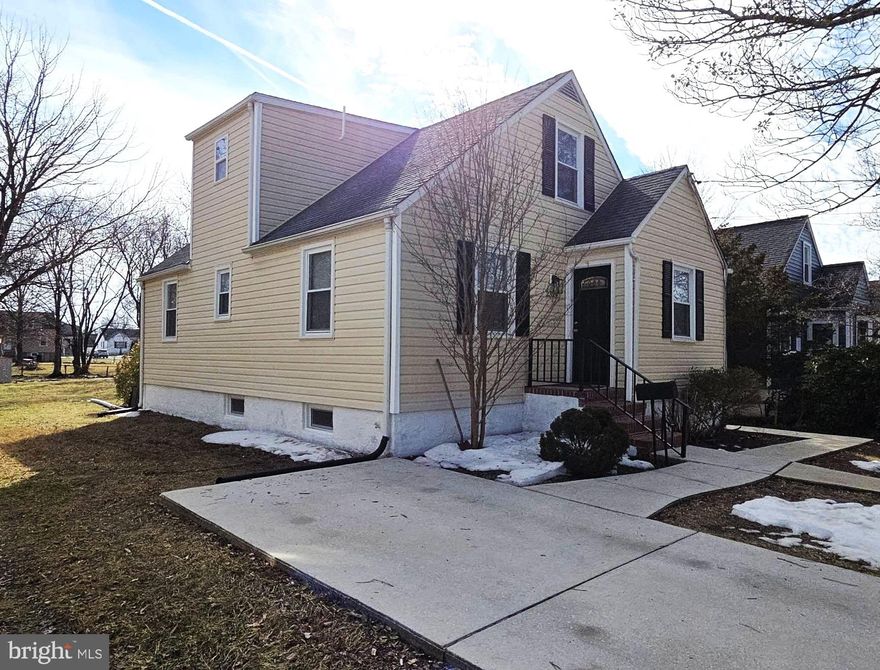 Perfectly placed on a ¼ acre lot is this renovated Cape Cod offering 4 bedrooms, modern baths on all 3 finished levels, an updated kitchen with granite tops and stainless steel appliances, hardwood in the living area, plush new carpeting in the bedrooms with hardwood beneath them on the main level, ceiling fans throughout, freshly painted on every level, double-hung tilt-in windows, a large vinyl deck leading to a concrete patio in your level yard, paved walkways from front to back, off-street parking and so much more.  The lower level offers a spacious recreation room, a powder room, and abundant storage & laundry space, all of which connects to a walk-out leading to the yard.  All 2,100+ sq. ft. of its living space is perfectly prepared for years of enjoyment and immediate occupancy.  Convenient to shopping, schools, churches, professional services, I-95, 695 and more.  This is definitely a “Must See” house that is sure to please the most discriminating buyer.