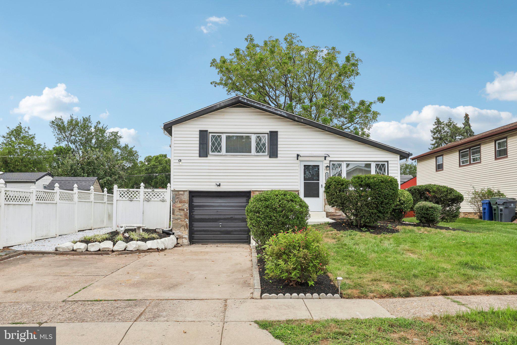 This beautifully updated home offers modern style and comfort with thoughtful renovations throughout. Enjoy new LVP flooring across the main living areas, fresh interior paint, and brand-new lighting fixtures. The fully renovated main bathroom features a new vanity, mirror, light fixture, toilet, tub, and shower tile. The complete kitchen renovation boasts granite countertops, stainless steel appliances, and stylish finishes. Bedrooms feature new carpet, while the updated basement bathroom offers fresh paint, new flooring, toilet, and mirror. Additional upgrades include new doors throughout, a freshly painted garage door and front steps, new blinds, and a charming front door portico. Outside, the new landscaping showcases flower beds, boulder rocks, and a pathway to the backyard, creating inviting curb appeal. *Mortgage savings may be available for buyers of this listing.*