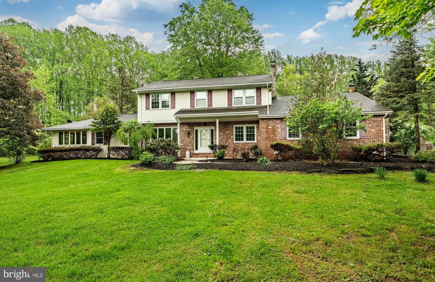 Stunning 5-Bedroom Colonial on 4+Private Acres!!  Welcome to your dream home! Nestled on a beautifully level and private four+ acre lot, this spacious Colonial offers the perfect blend of beauty, comfort, and space inside and out. With five bedrooms, three and a half bathrooms, and  three levels of living space, there's room for everyone to spread out and enjoy. The main floor features a desirable first-floor bedroom, with full  bath. Theres's also a 4 season sunroom,  dining room, living room, family room w fireplace, powder room and laundry area. The second floor offers a second owner's suite plus 3 additional bedrooms and hall bath offering plenty of flexibility for family, guests, or a home office. Downstairs, the partially finished basement provides extra space for a gym, rec room, or media room—whatever suits your lifestyle. Set well back from the road, the home is surrounded by mature trees and open, usable land—perfect for outdoor living, play, or even a future pool or barn. Don’t miss your chance to own this rare combination of space, privacy, and functionality—all just a short drive from town. (There are 2 parcels. The one with the home on it and a second parcel equaling the 5+acres)