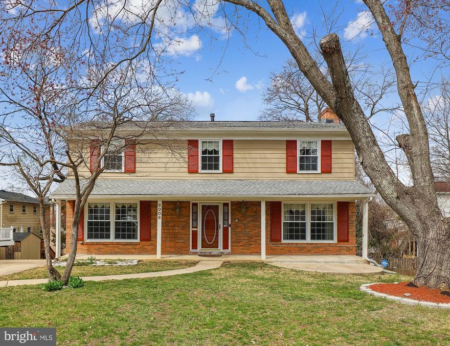 Opportunity just got better!! Come see the endless potential at this beautiful 6 bedroom Colonial in Wilton Hall is sun-drenched and ready for your personal touch.  Long time family home is available for first time in over 40 years.  The covered front porch greets you and that is just the beginning.  Huge foyer with double coat closets flanked by double parlors.  Oversize windows bring natural light to every corner of the home.  Use one of the parlors for the formal living and dining rooms and the other as the family gathering space around the gas fireplace.  The kitchen is in the back of the house making the flow of the home seamless.  In the kitchen you will find solid wood cabinets, corian counters and stainless appliances to include Kenmore Elite double oven, microwave, Kenmore electric cooktop, Viking hood and side by side fridge with water line.  Deck access from family room to take the entertaining outside.  Half bath and laundry on the main level complete this picture.  Heading upstairs you will find 5 bedrooms and 2 full baths.  All the bedrooms have spacious closets, window shades and ceiling fans.  Both bathrooms have updated tiles in the tub/shower and upgraded fixtures.  Pick out a vanity and your have a completely updated bathroom.  The primary bedroom has 3 closets and a laundry chute.  Heading to the lower level you will find a 6th bedroom with a great size walk-in closet; a rec room/media room; huge storage room and the unfinished mechanical area with even more storage space and a work bench.  With direct outside access to the backyard, options are endless on what you could do with the lower level.  Easily create another entertaining space or even another bedroom with full size window.  Be the envy of the neighborhood during storms with the whole house generator which is less than a year old and still under warranty.  A little sweat equity will go a long way in this truly unique property in sought after community.  Easy access to Telegraph and Rte 1 with a quick hop to 95/495 and less than a mile to the Huntington Metro.