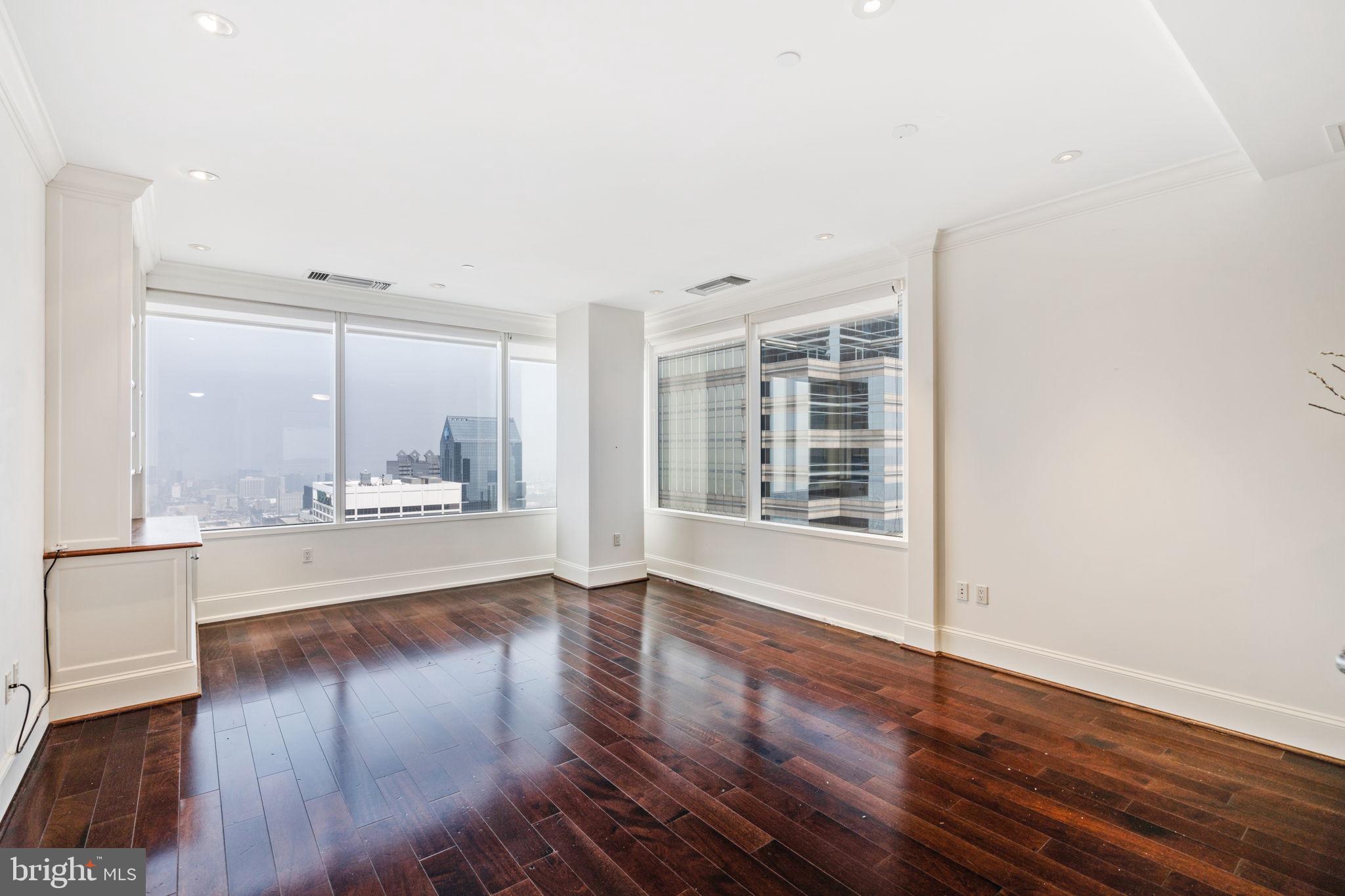Available August 3rd or 4th!. Welcome to this 43rd floor corner condominium nestled high above the city at the Iconic Two Liberty Tower! This home offers one of the highest floor residences in all of Philadelphia for an unbelievable price. Unit 4304 is 2 bed 2 full bath condo with an open kitchen, spacious living area and offers a split bedroom design. This condo features a designer kitchen, a Sub-Zero refrigerator, wine cooler, large range, espresso machine and of course a washer/dryer in-unit. The primary suite has a 5-piece luxurious bathroom. The views are truly spectacular including incredible sunset views. Wait till you experience the reflections from the neighboring sky scrapper towers. BRAND NEW STATE OF THE ART AMENITIES include 24/7 concierge, lounge, Locker rooms with saunas, fitness center, bike storage, business center, and even a chauffeured town car available to book for short City trips. Two Liberty is conveniently located near multiple iconic Philadelphia parks, 30th Street Station, City Hall, countless shopping options, grocery stores, restaurants, and services. Live above it all! Valet parking is available at an additional fee. One storage locker included on the same floor. Available August 3rd or 4th!