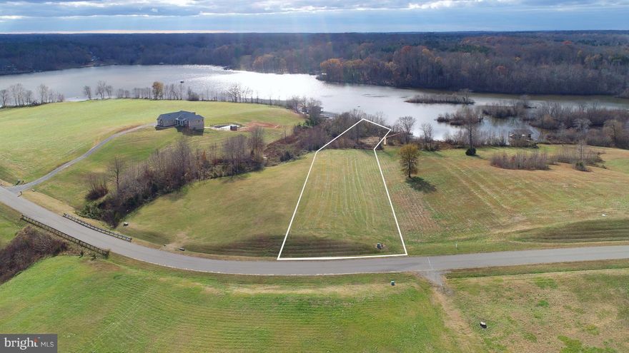 Beautiful waterfront lot with 180' of water-frontage! Very close to Tim's Restaurant, located in a great part of the lake, already cleared home site, and at the end of a quiet cul-de-sac. Its waiting for you to build your dream home on!