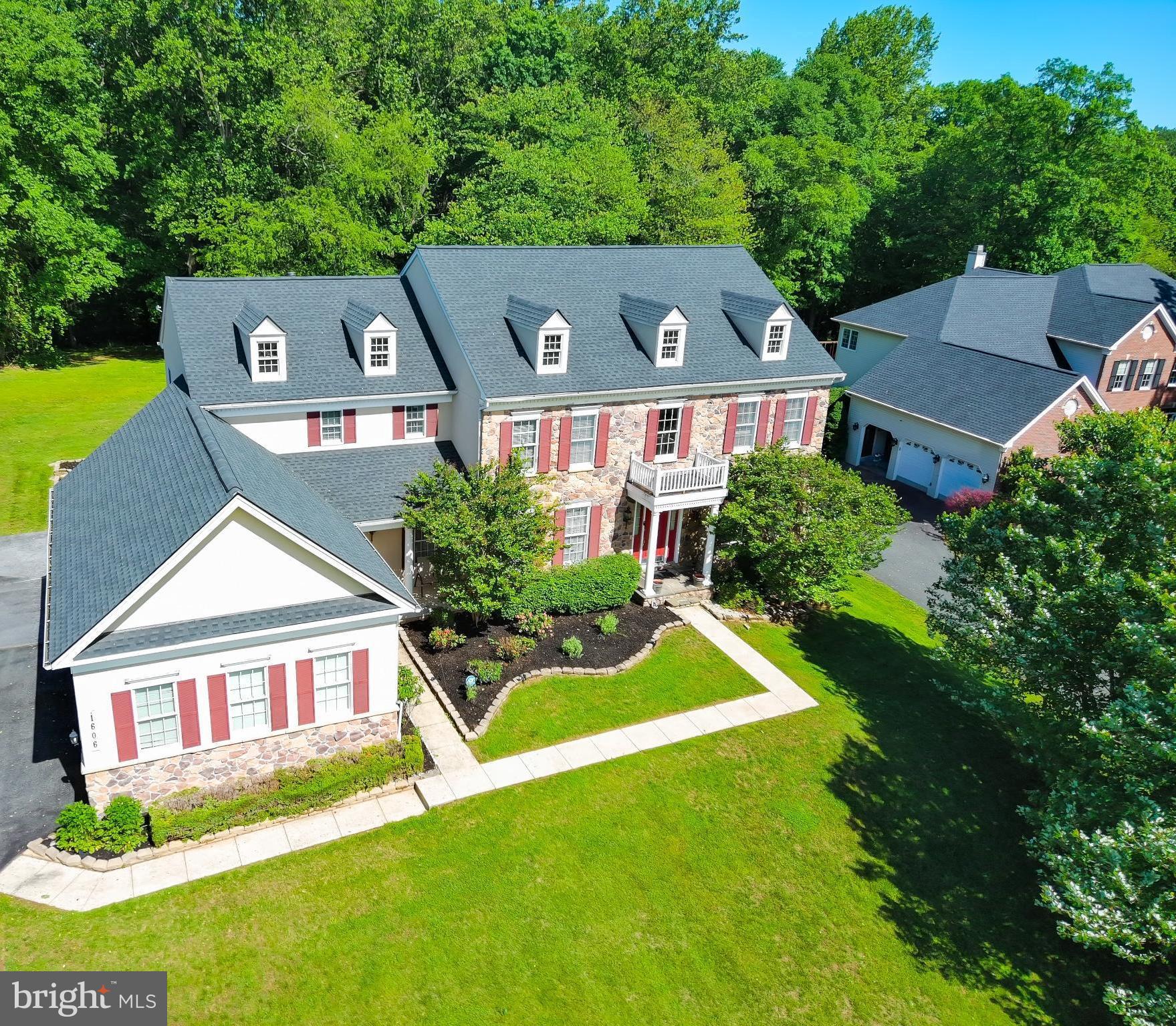 Step into this spacious 5-bedroom, 5.5-bath residence nestled in the highly coveted Morning Brook Farms community. From its expansive layout to the thoughtful design details, this home offers the perfect balance of everyday functionality and effortless entertaining.
The main level welcomes you with rich hardwood flooring, detailed moldings, chair rails, and architectural columns that add character and sophistication throughout. The inviting floor plan flows seamlessly from the sunken family room with a cozy gas fireplace, into the spacious gourmet kitchen and elegant formal dining room—creating an ideal space for gathering with family and friends. The kitchen was thoughtfully designed for both culinary creativity and connection, featuring ample space to cook and entertain.
Additional highlights on the main floor include a formal living room, a private home office, sunroom, and laundry area located just off the oversized 3-car garage.
Upstairs, the luxurious primary suite serves as a peaceful retreat with its own fireplace, sitting area, walk-in closets, and spa-like bathroom featuring a jetted tub and separate shower.
The fully finished lower level extends the living space and offers incredible flexibility, complete with an additional bedroom, full bath, second full kitchen, fitness room, movie room, and walk-out access to the backyard—ideal for guests.
Step outside to your backyard oasis, perfect for entertaining, gardening, or simply enjoying a quiet moment surrounded by nature.
With space, comfort, and charm at every turn, this home is ready to be the backdrop for your next chapter.