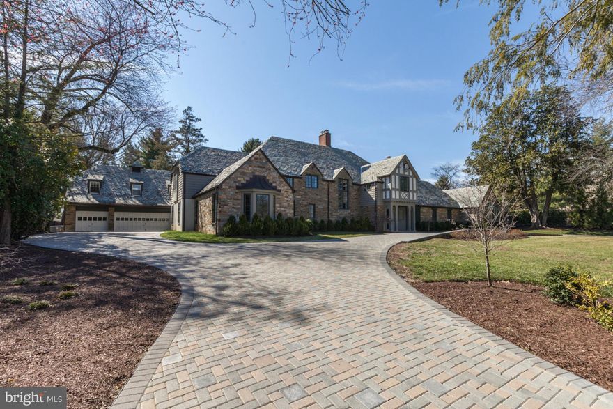 This beautiful 6BR/7BA home in Forest Hills has so much to offer. The home features the "great room" with soaring ceilings and exposed beams. The kitchen comes with top of the line stainless steel appliances and opens up in to the family room.  The lower level features an exercise room, open living area, with the exterior featuring a large pool.  The guest house offers 2 additional bedrooms.