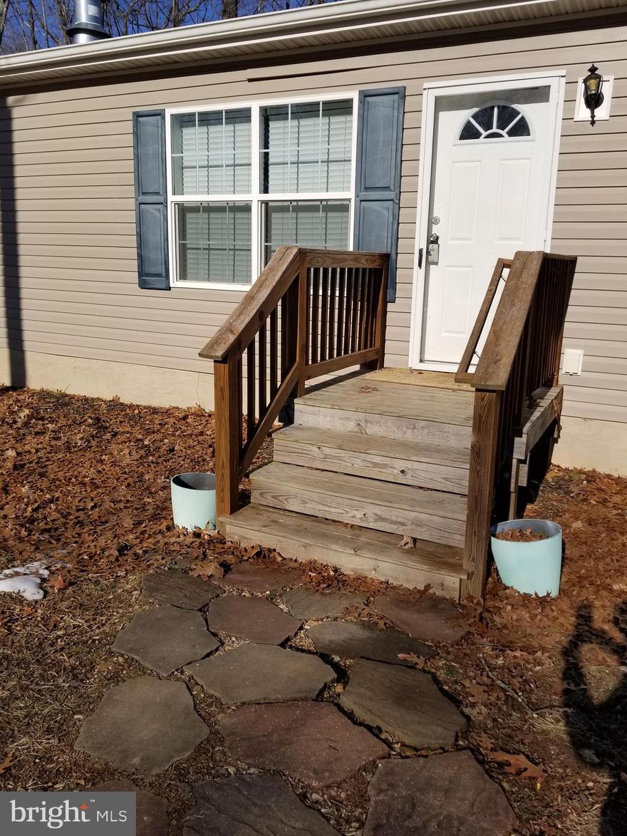 Country living at it's best.  Bucolic 6+ acre property on a quiet dead end road.  Yet convenient to Gordonsville, Mineral and Zion Crossroads.  Home  has 3 bedrooms and 2 full baths all on  one floor.  With an open floor plan, the Living area has plenty of room to spread out. Enjoy the gas log fireplace on those wintery nights.  The split floor plan has two bedrooms and a full bath on one end of the house and the owner's suite on the other end of the house.  Enjoy the outdoors with a large back deck overlooking a koi pond.  A pergola gives you the quiet area to rest and relax.  The storage shed has access to drive your mower in and has plenty of storage shelves.  Come to the country and enjoy your secluded retreat.