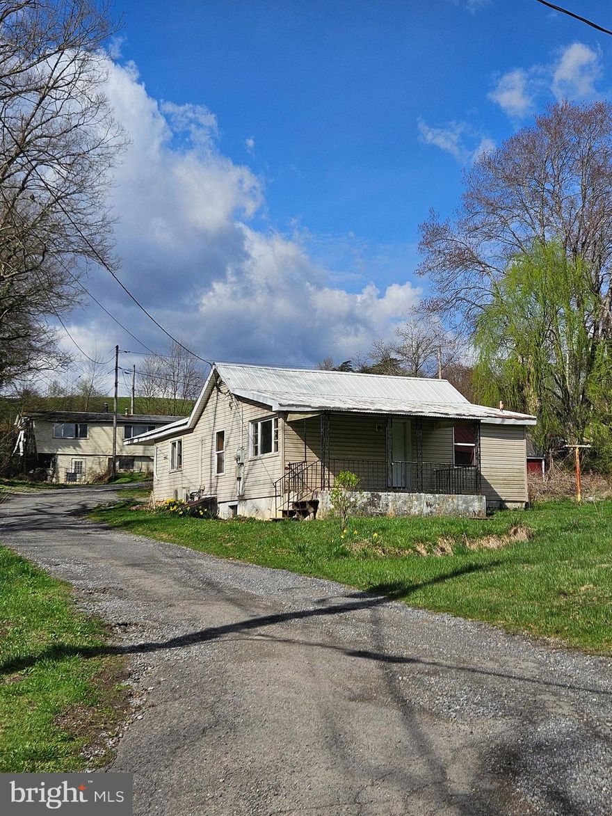Over 1 acre in McClure, Mifflin County. Currently 2 homes on 1 property. Both homes need extensive repair/rehab or remove and build new. It appears that there are 2 septic tanks. There also appears to have been a 3rd property on the upper part of the property.  3 seperate electric meters. Looking for a cash offer only. Seller recently moved out of the main home. Rear property has been vacant for a while.. Seller has NEVER lived in property and therefore has limited information. Property being sold AS-IS, WHERE-IS.