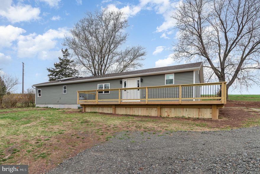 Welcome to this beautifully remodeled home, nestled in a serene country setting in Upper Paxton Township and located within the Millersburg Area School District.  Step inside to discover 1,680 square feet of thoughtfully finished living space, featuring all-new windows, plumbing, electric, attic insulation,  siding, drywall, flooring, recessed lighting and more. Updated kitchen complete with brand-new stainless steel appliances, and gas range. The layout has been enhanced with the addition of a full primary bath, creating a true primary suite retreat. As you enter, you’re greeted by a versatile mudroom/office space.  Convenient laundry area just off the bedrooms. The cozy living area is warmed by a propane fireplace, making it the perfect spot to unwind. Outside, you'll find a detached shed equipped with electric—perfect for use as a workshop, hobby space, or she shed. An upper attic area provides additional storage options, making it as functional as it is versatile. There’s even the potential for solar hot water (equipment is in place but currently not connected). "Enjoy the benefits of a larger lot, offering flexible outdoor space for entertaining, gardening, or relaxing. Don’t miss this move-in-ready gem with modern upgrades, generous outdoor space, and convenient access to local amenities!