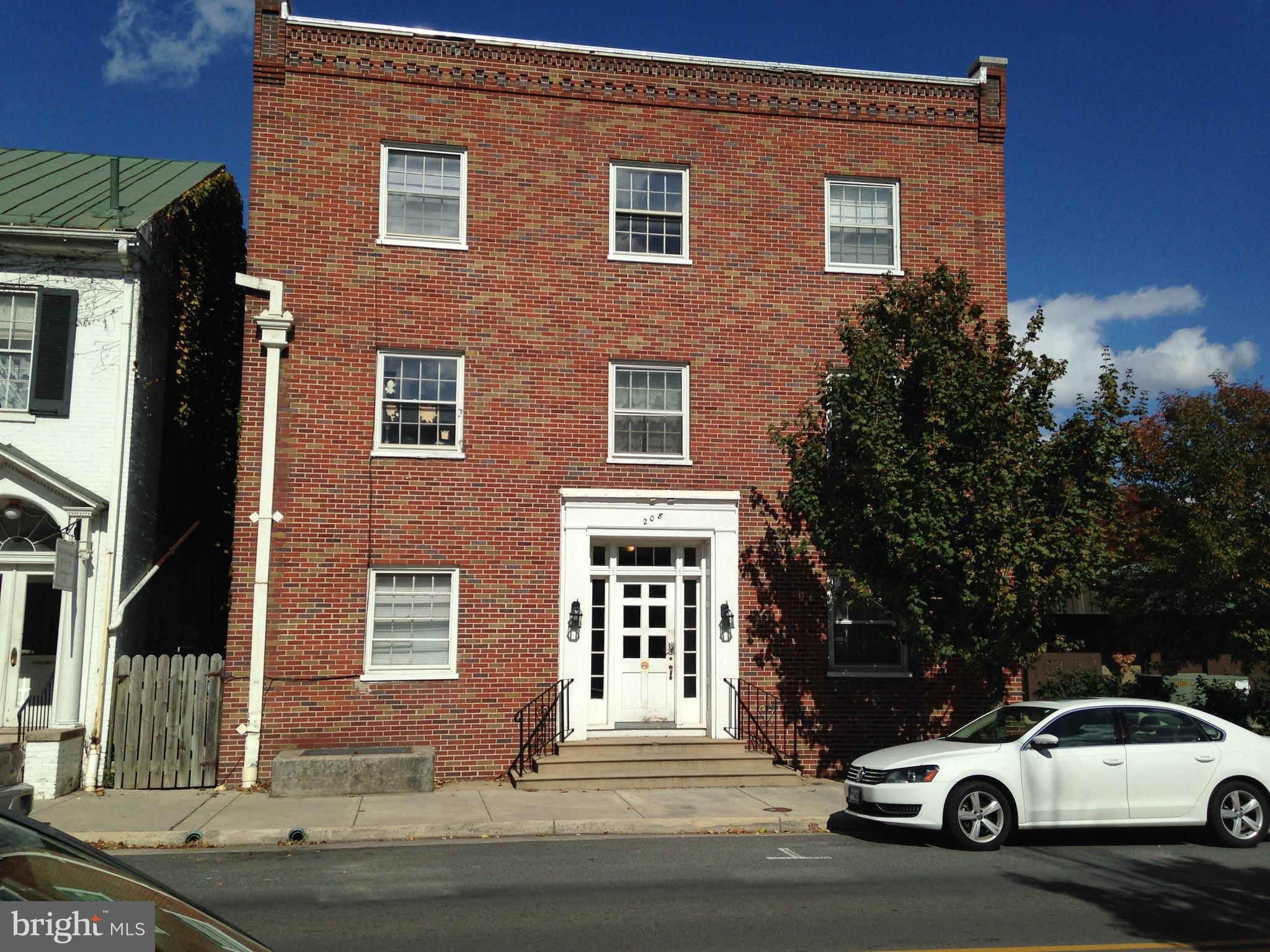 Enjoy the charm & convenience of downtown living in this 2 bedroom, 1 bath second floor apartment located just steps from Winchester's historic shops, restaurants & entertainment. This comfortable apartment features an efficient layout with easy access to coin operated laundry facilities on the main floor. A shared rear deck area provides a great spot to relax. Cats considered on case by case with pet deposit & pet rent per month. Credit minimums apply. No previous evictions. Sq Ft is approximate