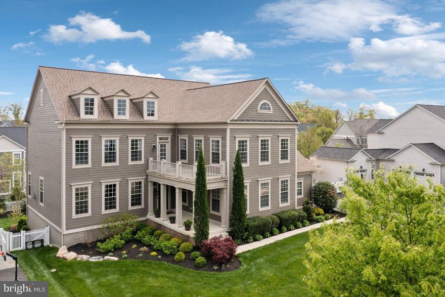 Open House, Sunday June 22nd from 11am - 1pm!  Enhance your living experience with this exquisite property nestled in the highly coveted Grove at Willowsford. This wonderful Integrity Homes Graye model features 5 bedrooms, 4.5 bathrooms, 2 car side load garage and over 5700 finished square feet.  This stunning home is an entertainer's dream and has an amazing backyard oasis featuring a 15 x 35 heated salt water pool, tanning ledge, LED changing color lights, 1000+ square foot travertine paver multi level patio, a covered deck, professional landscaping, vinyl fenced rear yard.  

Enjoy cooking your gourmet meals in this luxurious chef's kitchen featuring an oversized island with built-in seating, new Bosch stainless steel appliances,  a five burner cooktop, upgraded cabinetry, granite countertops and custom walk-in pantry.  Situated off the kitchen is a cozy family room with a gas fireplace. Complimenting the main level is a formal dining room with crown and chair moldings,  a great home office, stylish half bathroom and mudroom.  

Ascend to the upper level to discover an indulgent primary owner's suite featuring a sitting room, walk-in custom closet, primary owners spa bathroom with an oversized shower, soaking tub and dual vanities and a private balcony.  Completing the upper level are 3 spacious bedrooms featuring a Princess suite with a private bath, two additional bedrooms with a shared ensuite bathroom and a laundry room with ample cabinetry and utility sink.

Venture downstairs to the fully finished walk-out basement with an enormous rec room, a great wet bar, media room, 5th bedroom, full bathroom and storage room.  Additional property updates and features include new roof in 2024, custom gunite pool in 2023, hardwood flooring on the main and upper levels in 2023, luxury vinyl plank flooring on the lower level in 2023, updated shared bathroom and half bathroom in 2023, custom closet on the main level in 2023, whole house repainted in 2022 & 2023, shiplap, moldings, lighting in 2022 and much more!  

Don't miss the opportunity to make this exquisite property your next home! Enjoy all of the amenities that Willowsford has to offer including two lodges, resort style pools, a complete functioning gym, outdoor pavilion, kayaking on the lake, 2000 acres of open space, ponds, woodlands and natural habitat with miles of maintained walking trails and a community farm to table farm! Enjoy community movie nights, 4th of July fireworks, neighborhood events and so much more! Minutes to shopping, dining, grocery, major commuter routes of Rt.  Rt. 50, Rt. 28, I-66 and Dulles Airport. Schedule a showing today and experience unparalleled luxury living!