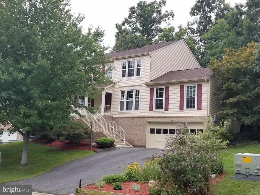 Beautiful and well maintained two-story colonial in the heart of Lake Ridge. This home features 4 bedrooms, 2.5 bathrooms, approximately 3,021 finished sq ft, an eat-in kitchen , a spacious family room with a fireplace, a finished basement rec room, and formal living and dining rooms. The charming, fully fenced backyard boasts a large deck, perfect for relaxing and grilling. Lake Ridge offers 6 swimming pools, tot lots, ball courts, trails, and is just a few minutes from Historic Occoquan, Potomac Mills, Stonebridge, VRE, HOV Lots, and the Potomac River. This home offers both comfort and convenience.