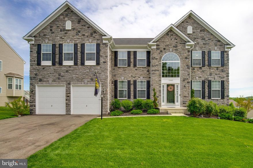 The question is what doesn't this house have?  Immaculate home in sought after Eagle Pointe Community boasting over 6400sqft of luxury living.  This Estate home has everything!  Grand entrance with cathedral ceiling; beautiful chocolate- hardwood floors throughout the main level.  Formal living, dining room, sunroom, and an office.   The family room is grand and welcoming with a cathedral ceiling and fireplace.  The eat-in gourmet kitchen has double wall ovens, granite counter tops, built-in microwave and gas cooktop.  What could make this space better -- a beautiful sun filled solarium overlooking the backyard.  Double staircases will take you to the upper level where the grandest of master suites is located.  The master suite has a step-down sitting area with fireplace, beautiful master bath with granite countertops, his/her sinks, a soaking tub and separate shower, and a large walk-in closet.  The walk-up basement has oh so many possibilities.  There's a separate room that can be used as a gym, a large open recreation room for leisure and entertainment, and a bedroom/in-law suite that contains a bedroom with a sitting area and full bath. The outside features a full deck with a underneath patio for maximum outdoor enjoyment.  Furniture is also for sale so make an offer and negotiate.