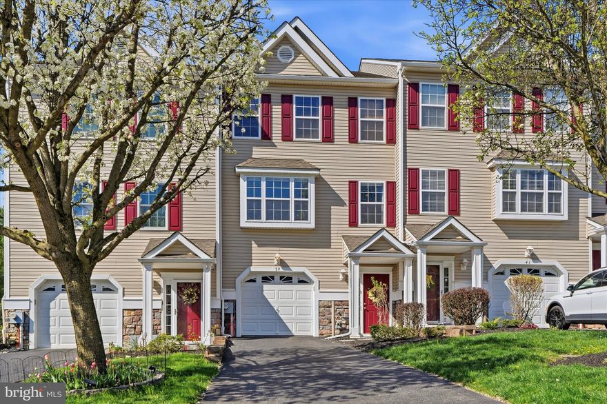 Welcome to 39 Hoag Ln, a beautifully maintained townhouse offering the perfect blend of comfort and functionality in the sought after Spring Valley Estates community.  Boasting approximately 2,080 square feet of well-designed living space, this home features 3 spacious bedrooms, 2.5 bathrooms, garage, private driveway and an array of desirable amenities that make it stand out. Whilst located in a quiet homely community, this home is only 6 mins from the Wawa train station offering direct connectivity to centre city Philadelphia!

As you step inside, you’ll immediately notice the bright open space. There are hardwood and tile floors that flow throughout the main living areas, adding both style and durability. Upgrades include motorized window shades, Lutron designer dimmers, an upgraded home lighting package which includes high hats in all rooms on each level. The cozy living room is the perfect spot to relax by the gas fireplace, creating a welcoming ambiance. The functional kitchen includes newer stainless steel appliances, granite counter tops and a convenient pantry, giving you plenty of storage space to stay organized. Adjacent to the kitchen, the formal dining room is ideal for hosting dinners and entertaining guests. The modern, low maintenance Trex deck is a wonderful extension of the living space, providing a relaxing outdoor retreat overlooking a beautiful wooded backyard.Upstairs you will find three spacious bedrooms and two baths. The entire floor has upgraded carpet and padding. The primary suite boasts a walk-in closet. The lower level is also finished with upgraded carpet and padding which leads to a walk-out private outdoor patio. 
This is a fantastic opportunity to own a move-in-ready property that delivers on both charm and practicality. Don’t miss your chance to make this townhouse at 39 Hoag Ln your new home! Call today to schedule your private showing.