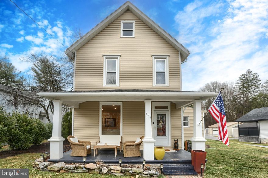 Charming single-family home located in the heart of Camp Hill Borough! This 3-bedroom, 1.5-bath home offers 1,392 square feet of comfortable living space on an oversized 0.73-acre lot. The beautifully remodeled full bathroom features a tiled tub/shower surround, custom vanity mirror, and a Bluetooth-enabled smart fan for modern convenience. The open eat-in kitchen is highlighted by upgraded countertops and a stylish tile backsplash. Hardwood and vinyl plank flooring run throughout the first floor, adding warmth and durability. Enjoy the beautifully landscaped yard from the covered front porch or the spacious rear deck—perfect for relaxing or entertaining. Conveniently located near parks, shopping, restaurants, and major highways.