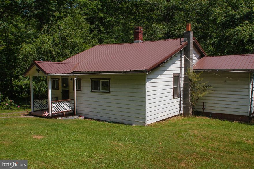 What a fantastic property! Hunting and fishing enthusiasts would surely appreciate its proximity to the North Branch of the Potomac River and the Savage River State Forest. Walk out your back yard into the Savage River State Forest and out your front yard to the right just across the road. House has new roof, hot water heater, furnace, gas range.  Being located just outside of the delightful town of Kitzmiller adds to its charm and provides a peaceful environment. Additionally, the close proximity to Wolf Den Run State Park offers more opportunities for outdoor activities and enjoying the natural beauty of Western Maryland.