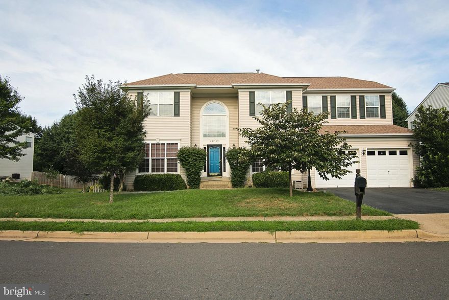 Fantastic over 4400 finished SF of luxury living. This home features a gourmet Kit. w/island,two story foyer, HW floors, upgraded moldings throughout, main level office with builtin bookcases.  Upper level features a huge master bedroom with vaulted ceilings, custom closet, sitting room w/ wet bar luxury bath w/jetted tub and sep shower.Finished W/O.  Close to schools shopping and commuter routes.