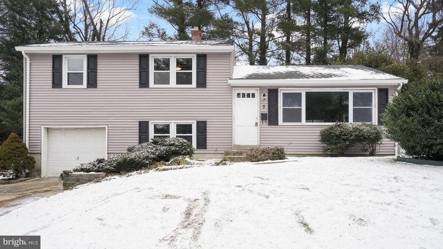 Fantastic opportunity to own in the Rollingwood community of Catonsville! This spaciously renovated split-level features an open concept floor plan, hardwood flooring on main & upper levels, updated kitchen with stainless steel appliances & quartz countertops, custom master bathroom, elegant light fixtures, screened-in rear porch and a fully fenced backyard. Comes with a 1-Yr HMS Home Warranty!