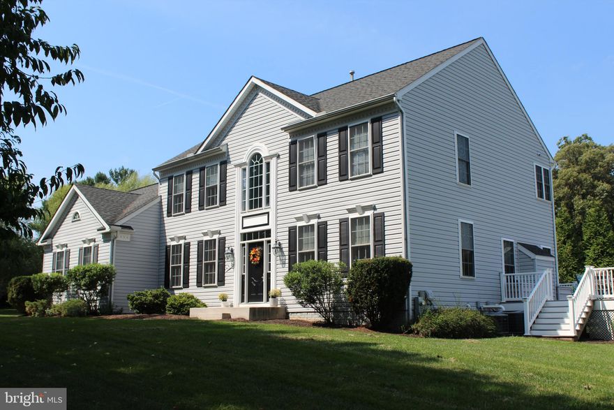 LOOKING FOR CONVENIENCE IN A COUNTRY SETTING?  DON'T MISS THIS AMAZING COLONIAL STYLE HOME WITH 4 BED ROOMS, 3 1/2 BATHS ALL ON A 1.78 ACRE LOT!! THIS HOME OFFERS A TWO STORY FOYER * FORMAL  LIVING RM WITH FRENCH DOORS * FORMAL DINING RM WITH CROWN MOLDING & CHAIR-RAIL * HUGE GOURMET KITCHEN WITH GAS COOK-TOP, SILESTONE COUNTERS, LARGE PANTRY, CERAMIC TILE, 42" CABINETS & BREAKFAST RM OFF KITCHEN W/AN  EXIT TO THE LARGE TREX DECK WITH VINYL RAILINGS * FAMILY RM WITH LOTS OF WINDOWS & GAS FIREPLACE * MUD RM/LAUNDRY RM ON FIRST FLOOR & OVERSIZED 2 CAR GARAGE. THE SECOND LEVEL OFFERS LARGE  BEDROOMS & A MASTER SUITE W/CATHEDRAL CEILING & A LG MASTER BATH TO INCLUDE A DOUBLE SINK, SOAKING TUB & SEPARATE SHOWER. THE LOWER LEVEL IS NEWLY FINISHED WITH A WET BAR * ROOM FOR ENTERTAINING OR POOL TABLE * TV AREA WITH SPECIAL CEILING LIGHTING & SURROUND SOUND * FULL BATH & WIDE WALK-OUT STAIRS FOR EXTRA NATURAL LIGHT!  ALL OF THIS & MORE ON A GORGEOUS LEVEL LOT READY FOR WHAT YOU WANT TO MAKE IT YOUR OWN! THE LIST GOES ON, THIS IS A MUST SEE, COME VISIT TODAY!!